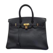 Pre-owned Leather handbags Hermès Vintage , Black , Dames