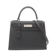 Pre-owned Leather handbags Hermès Vintage , Black , Dames