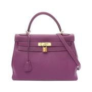 Pre-owned Leather handbags Hermès Vintage , Purple , Dames