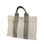 Pre-owned Canvas handbags Hermès Vintage , Beige , Dames