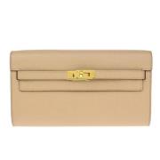 Pre-owned Leather clutches Hermès Vintage , Beige , Dames