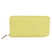 Pre-owned Leather wallets Hermès Vintage , Yellow , Dames