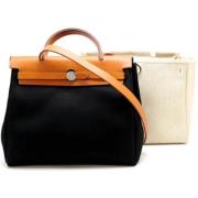 Pre-owned Canvas handbags Hermès Vintage , Black , Dames