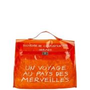 Pre-owned Vinyl handbags Hermès Vintage , Orange , Dames