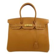 Pre-owned Leather handbags Hermès Vintage , Brown , Dames