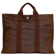 Pre-owned Canvas handbags Hermès Vintage , Brown , Dames