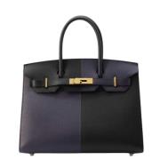 Pre-owned Leather handbags Hermès Vintage , Black , Dames