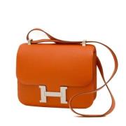 Pre-owned Leather crossbody-bags Hermès Vintage , Orange , Dames