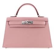 Pre-owned Leather handbags Hermès Vintage , Pink , Dames