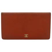 Pre-owned Leather wallets Chanel Vintage , Orange , Dames