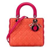 Pre-owned Leather handbags Dior Vintage , Orange , Dames