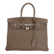 Pre-owned Leather handbags Hermès Vintage , Brown , Dames