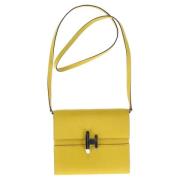 Pre-owned Leather clutches Hermès Vintage , Yellow , Dames