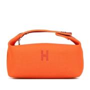 Pre-owned Canvas pouches Hermès Vintage , Orange , Dames