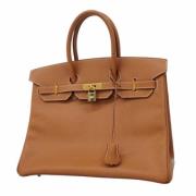 Pre-owned Leather handbags Hermès Vintage , Brown , Dames