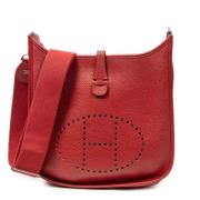 Pre-owned Leather handbags Hermès Vintage , Red , Dames