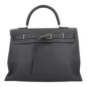 Pre-owned Leather handbags Hermès Vintage , Black , Dames