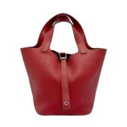 Pre-owned Leather handbags Hermès Vintage , Red , Dames