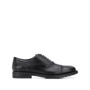 Zwarte Leren Veterschoenen Met Platte Zool Tod's , Black , Heren