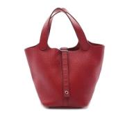 Pre-owned Leather handbags Hermès Vintage , Red , Dames