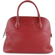 Pre-owned Leather handbags Hermès Vintage , Red , Dames