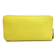 Pre-owned Leather wallets Hermès Vintage , Yellow , Dames