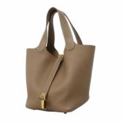 Pre-owned Leather handbags Hermès Vintage , Brown , Dames