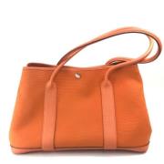 Pre-owned Leather shoulder-bags Hermès Vintage , Orange , Dames