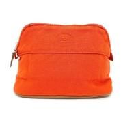 Pre-owned Cotton pouches Hermès Vintage , Orange , Dames