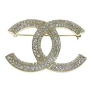 Pre-owned Metal brooches Chanel Vintage , Yellow , Dames