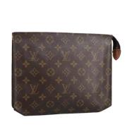 Pre-owned Canvas pouches Louis Vuitton Vintage , Brown , Dames