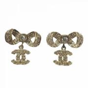 Pre-owned Metal earrings Chanel Vintage , Yellow , Dames