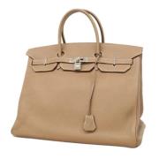 Pre-owned Leather handbags Hermès Vintage , Beige , Dames