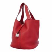 Pre-owned Leather handbags Hermès Vintage , Red , Dames