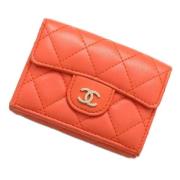 Pre-owned Leather wallets Chanel Vintage , Orange , Dames