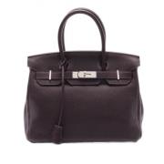 Pre-owned Leather handbags Hermès Vintage , Purple , Dames