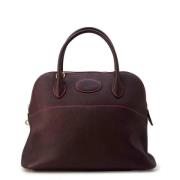 Pre-owned Leather handbags Hermès Vintage , Purple , Dames