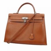 Pre-owned Leather handbags Hermès Vintage , Brown , Dames