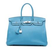 Pre-owned Leather handbags Hermès Vintage , Blue , Dames