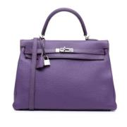 Pre-owned Leather handbags Hermès Vintage , Purple , Dames