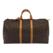 Pre-owned Canvas handbags Louis Vuitton Vintage , Brown , Unisex