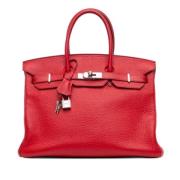 Pre-owned Leather handbags Hermès Vintage , Red , Dames