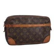 Pre-owned Canvas clutches Louis Vuitton Vintage , Brown , Dames