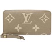 Pre-owned Leather wallets Louis Vuitton Vintage , Beige , Dames