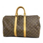 Pre-owned Fabric handbags Louis Vuitton Vintage , Brown , Unisex