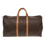 Pre-owned Canvas handbags Louis Vuitton Vintage , Brown , Unisex