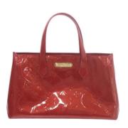 Pre-owned Leather handbags Louis Vuitton Vintage , Red , Dames