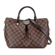 Pre-owned Canvas handbags Louis Vuitton Vintage , Brown , Dames