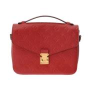 Pre-owned Leather clutches Louis Vuitton Vintage , Red , Dames