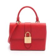 Pre-owned Leather handbags Louis Vuitton Vintage , Red , Dames